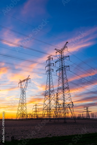 The pylons are in the evening, Substation in the evening, High voltage substation and beautiful sunset glow
