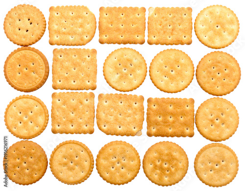 Assorted round and square crackers with golden baked texture and tiny dotted holes
