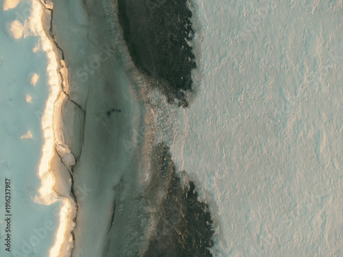 Wallpaper Mural Frozen lake shows winter ice formation and dark water Torontodigital.ca