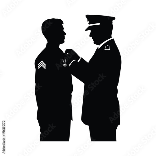 Military officer awarding medal to soldier in ceremony