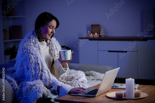 Young woman with warm blank...