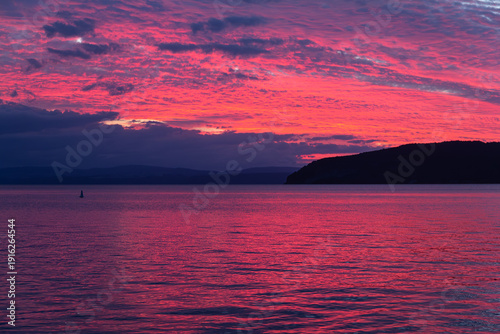 Wallpaper Mural Sunset at Lake Taupō, New Zealand. Whangamatā Bay, Kinloch. Vivid pink, purple sky. Torontodigital.ca