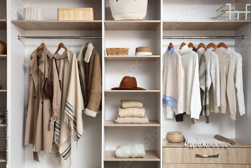 Stylish winter clothes hang...