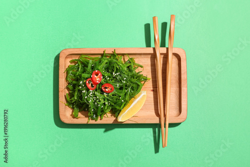 Wooden tray with tasty seaw...