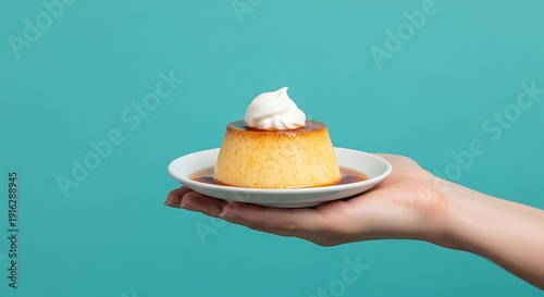 hand holding a flan dessert