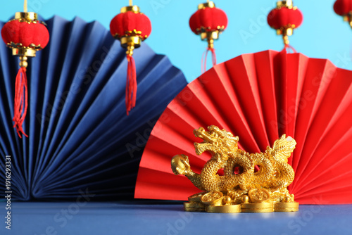 Golden dragon figurine, pap...
