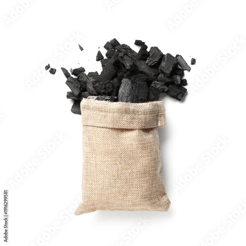 Bag with pieces of coal iso...