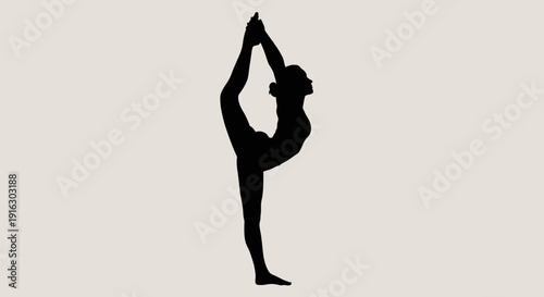 Woman practicing yoga in a serene landscape, standing on one leg with arms raised in a peaceful pose.