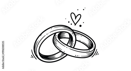 Intertwined wedding rings with heart symbol in romantic gesture