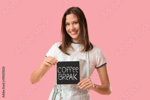 Happy young female barista ...