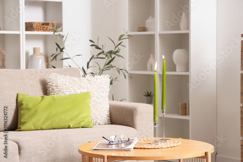 Burning green candles with ...