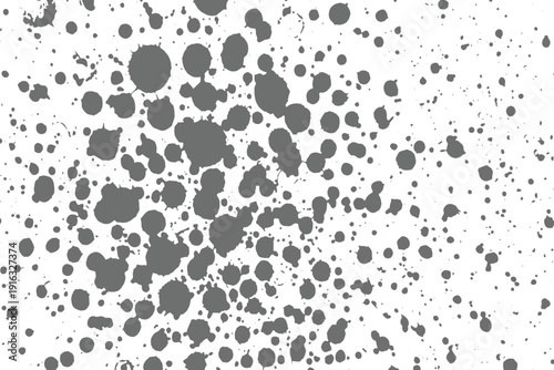 Black ink splatter and drops texture isolated on white background.