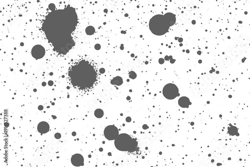 Black ink splatter and drops texture isolated on white background.