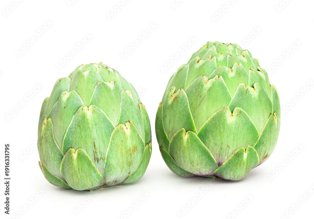Fototapeta premium two ripe artichokes on white background