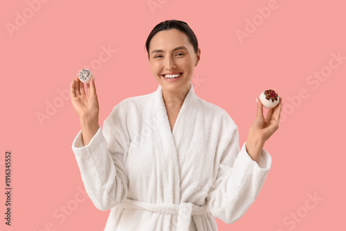 Smiling young woman with ba...