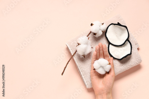 Female hand with towel, reu...