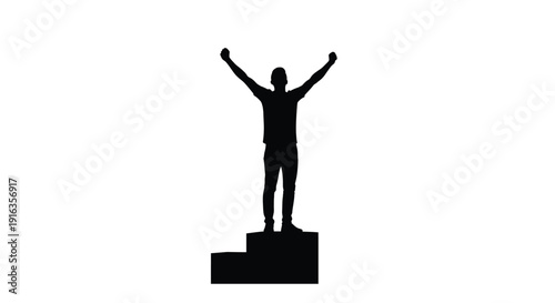 Silhouette of a person with arms raised standing on a pedestal