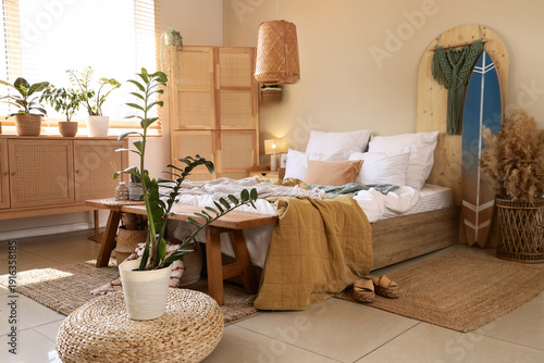 Interior of bedroom with su...