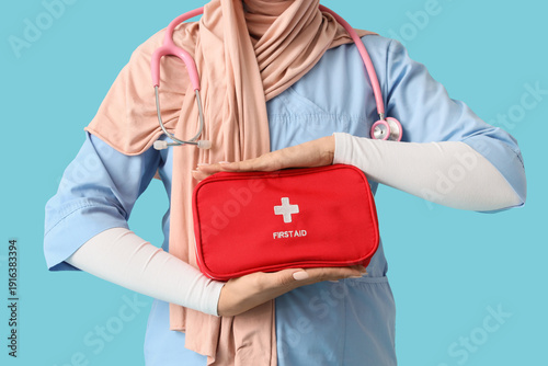 Female Muslim doctor in hij...