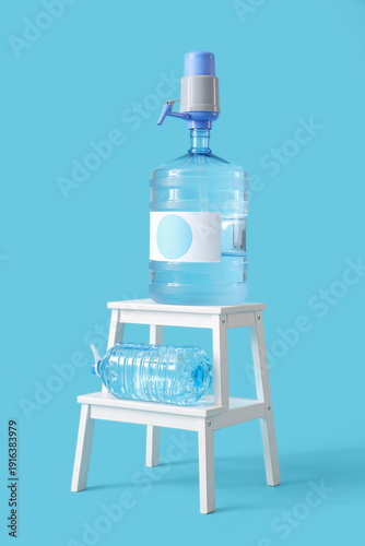 Stool with bottles of clean...