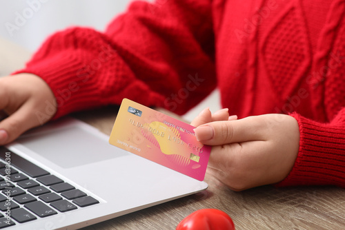 Woman with credit card and ...
