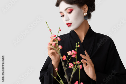 Elegant woman in black kimo...