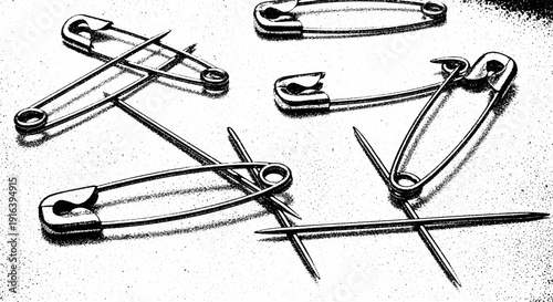 safety pins scattered, metal objects, close up, monochrome