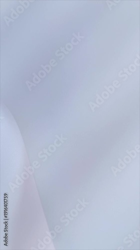 Ethereal gradient of soft lavender and subtle white curves creating a serene and delicate background texture with a dreamy, blurred aesthetic perfect for tranquil designs