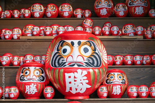 Shelves of Daruma Dolls at Katsuo‑ji Temple in Osaka, Japan