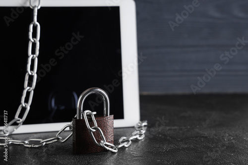 Padlock with chain and tabl...