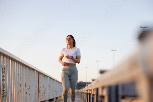 Fotografi Active fit woman going for a morning run
