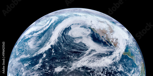 Earth From Space Closeup View Of Pacific Ocean And Clouds Isolated On Black Background. Elements of this image furnished by NASA.