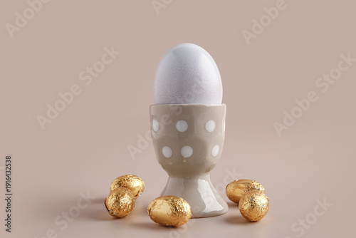 Ceramic holder with egg and...