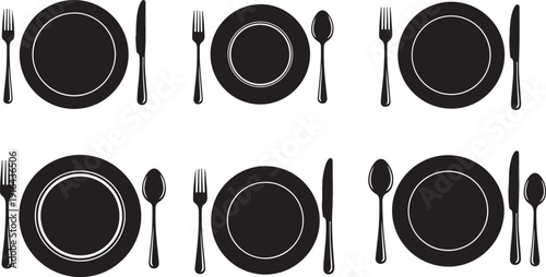Black and White Table Setting with Plates and Utensils