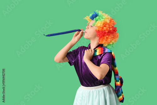 Funny girl in clown costume...