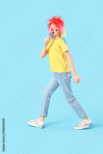 Funny girl in clown costume...