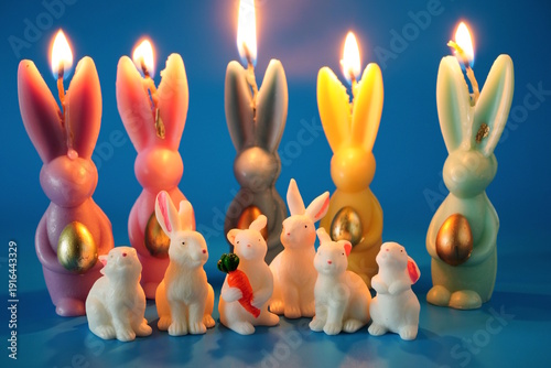 Wallpaper Mural Figures of toy rabbits and burning Easter candles. Torontodigital.ca