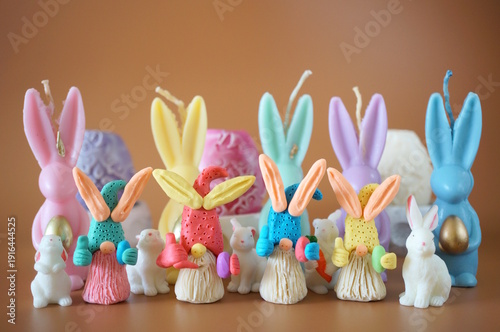 Wallpaper Mural Easter gnomes made of plasticine and decorative rabbits on a brown background. Torontodigital.ca