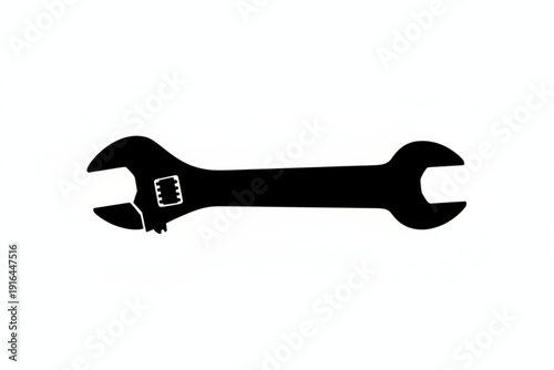 Industrial Silhouette: A striking silhouette of an adjustable wrench stands boldly, a testament to the essential tools of industry and craftsmanship.