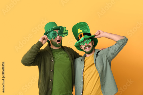 Young men in leprechaun hat...