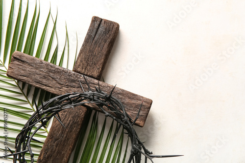 Wooden cross with palm leaf...