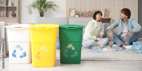 Young couple with container...