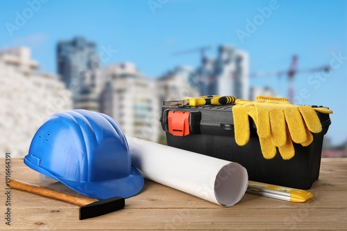 Hardhat, box, blueprint and...