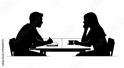 Silhouette of a man and woman seated at a table seemingly in conversation high quality professional