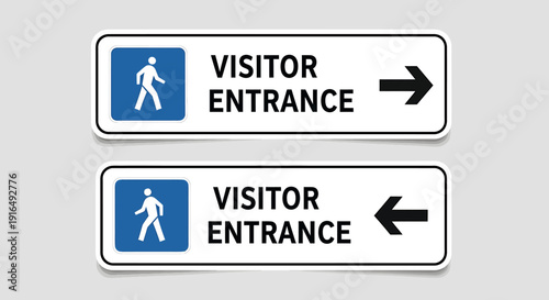 Visitor entrance signs with arrows pointing right and left directions
