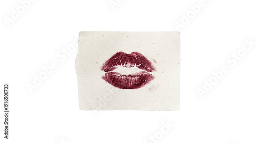 Obraz na płótnie Dark red lipstick kiss mark on a small textured paper scrap, isolated on transparent background