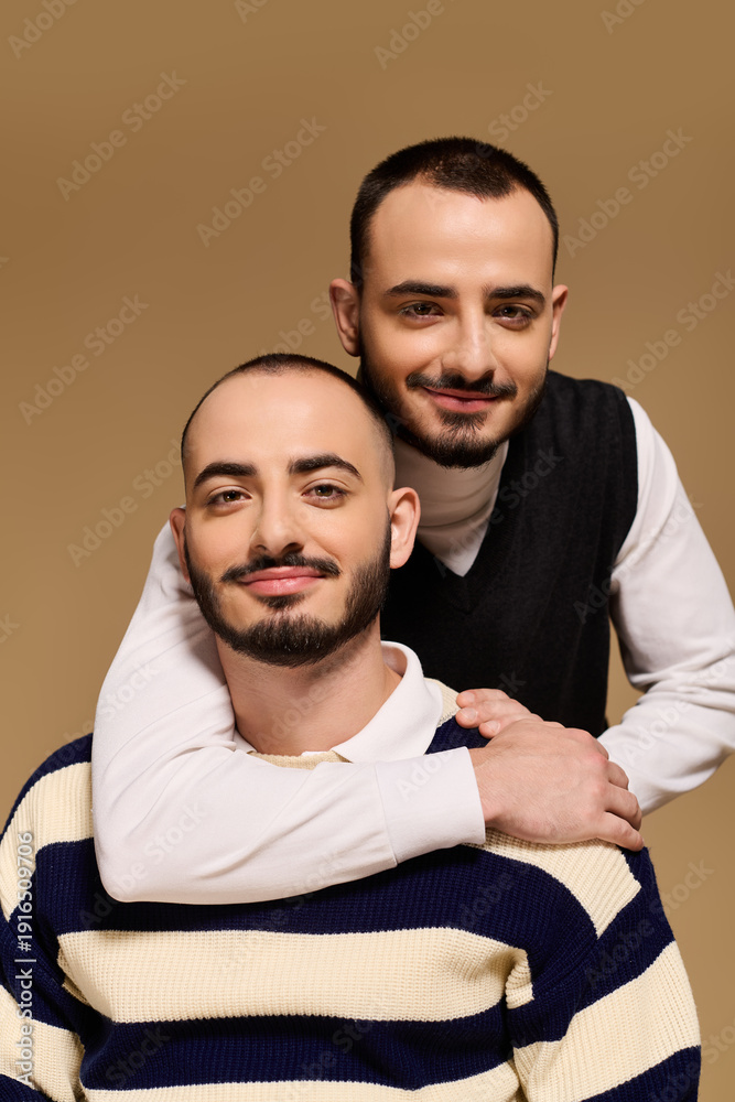 Obraz premium Stylish twins showcase brotherly bond in an elegant photo session