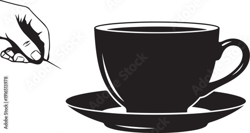 Hand holding a cup of coffee in black and white