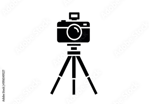 A black icon of a camera on a tripod stand