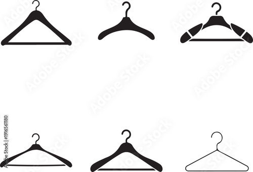 Collection of various black and white clothes hangers on white background